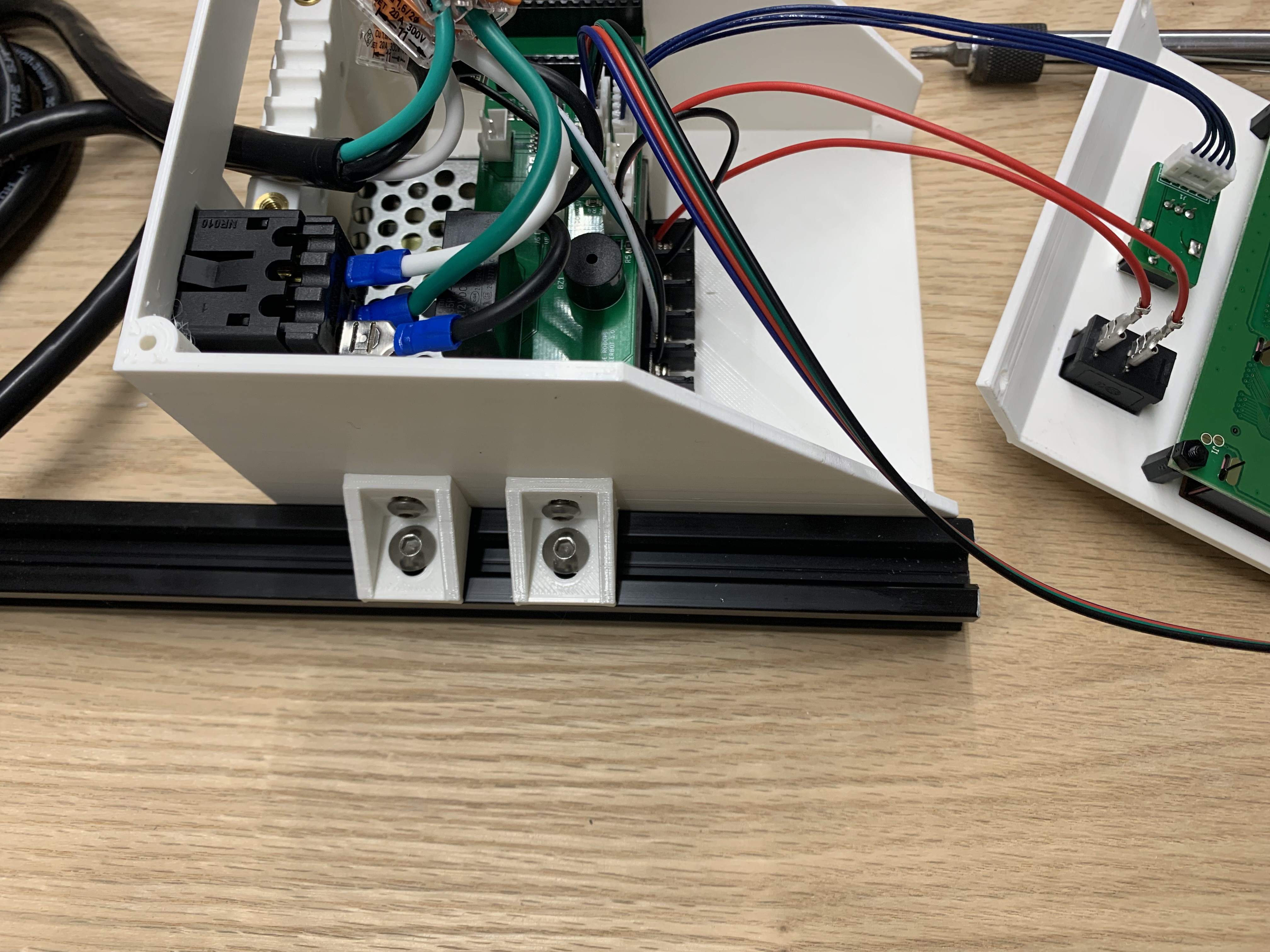 lower enclosure mounted to frame